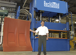 Beckwood press used to form aerospace cabin interiors