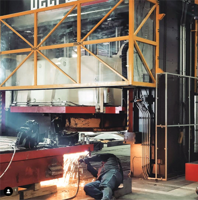 Mike Reynolds, Lead FIeld Service Technican welding a press
